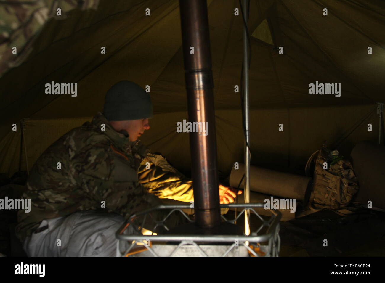 A 15th Engineer Battalion, 18th Military Police Brigade Soldier checks