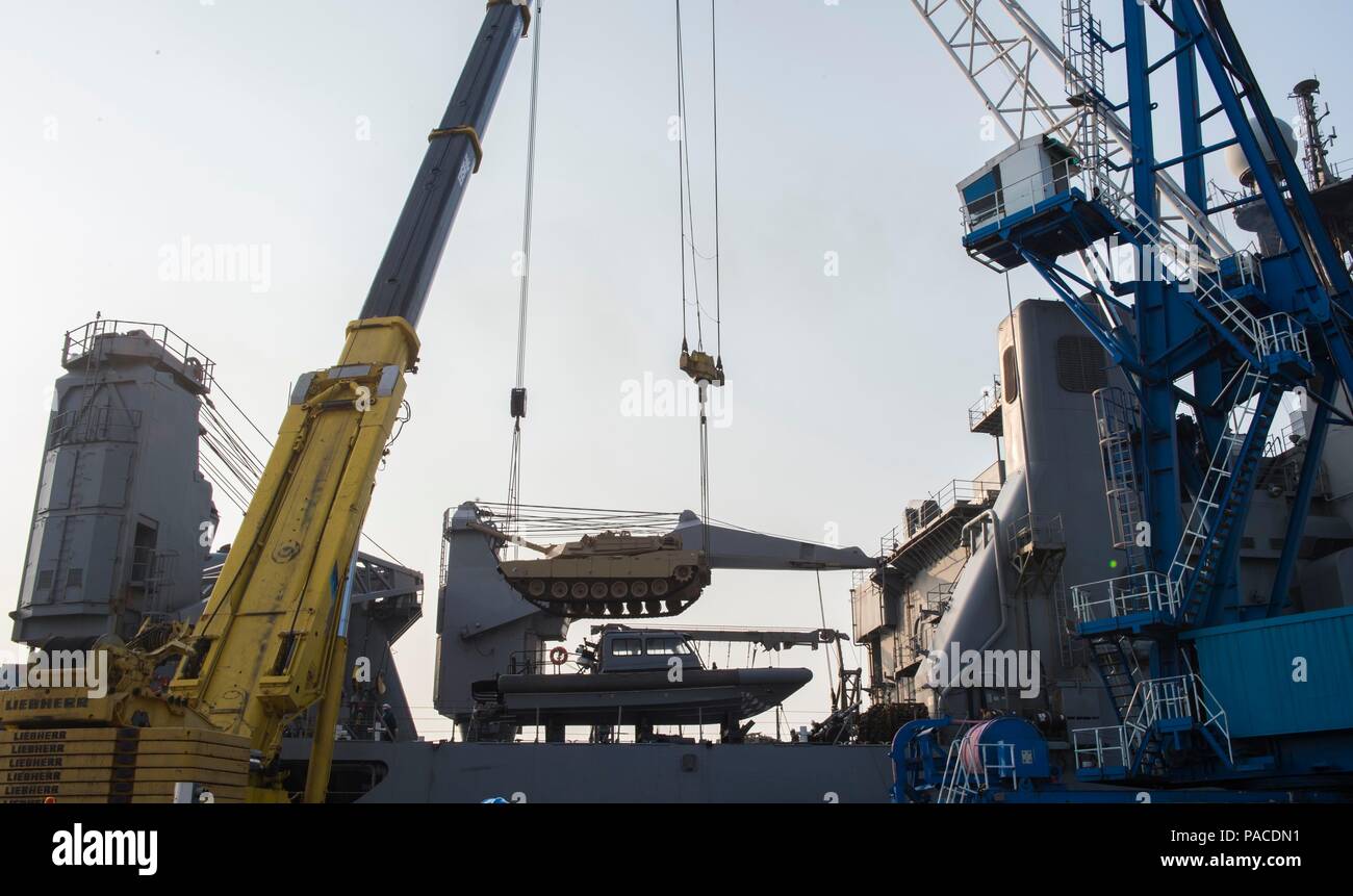 160314-N-RM689-034  GWANGYANG, Republic of Korea (March 14, 2016)- A M1A1 Abram tank attached to  Delta Company 1st Tank Battalion, 1st U.S. Marine Division is lifted by two  pier side cranes onto amphibious dock landing ship USS Ashland (LSD 48) to  prepare for the Assault Follow-On Echelon (AFOE) portion of Exercise Ssang  Yong 2016 (SY16). Ashland is assigned to the Bonhomme Richard Expeditionary  Strike Group and is participating in SY16, a biennial combined amphibious  exercise conducted by forward-deployed U.S. forces with the Republic of  Korea Navy and Marine Corps, Australian Army and Stock Photo