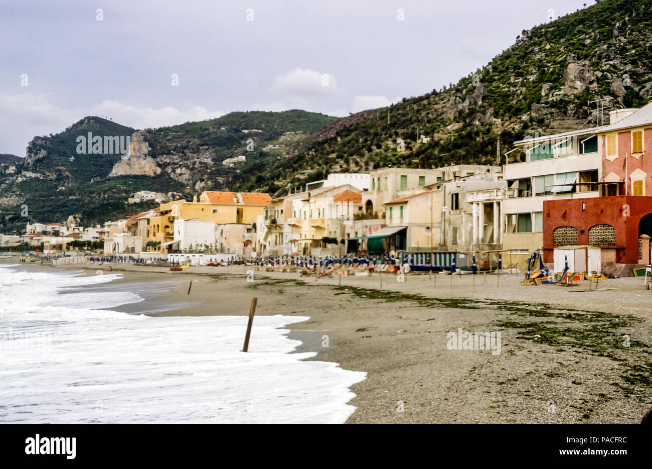 View of seaside buildings along the beach at Ventimiglia, Liguria, Northern Italy on the Italian riviera in the 1960s Stock Photo