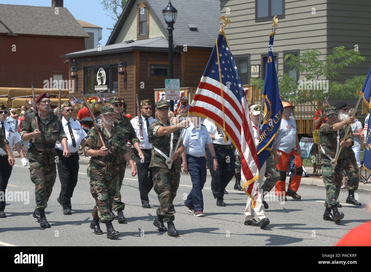 Local Veterans Foreign Wars marching in July 4th parade in Ely