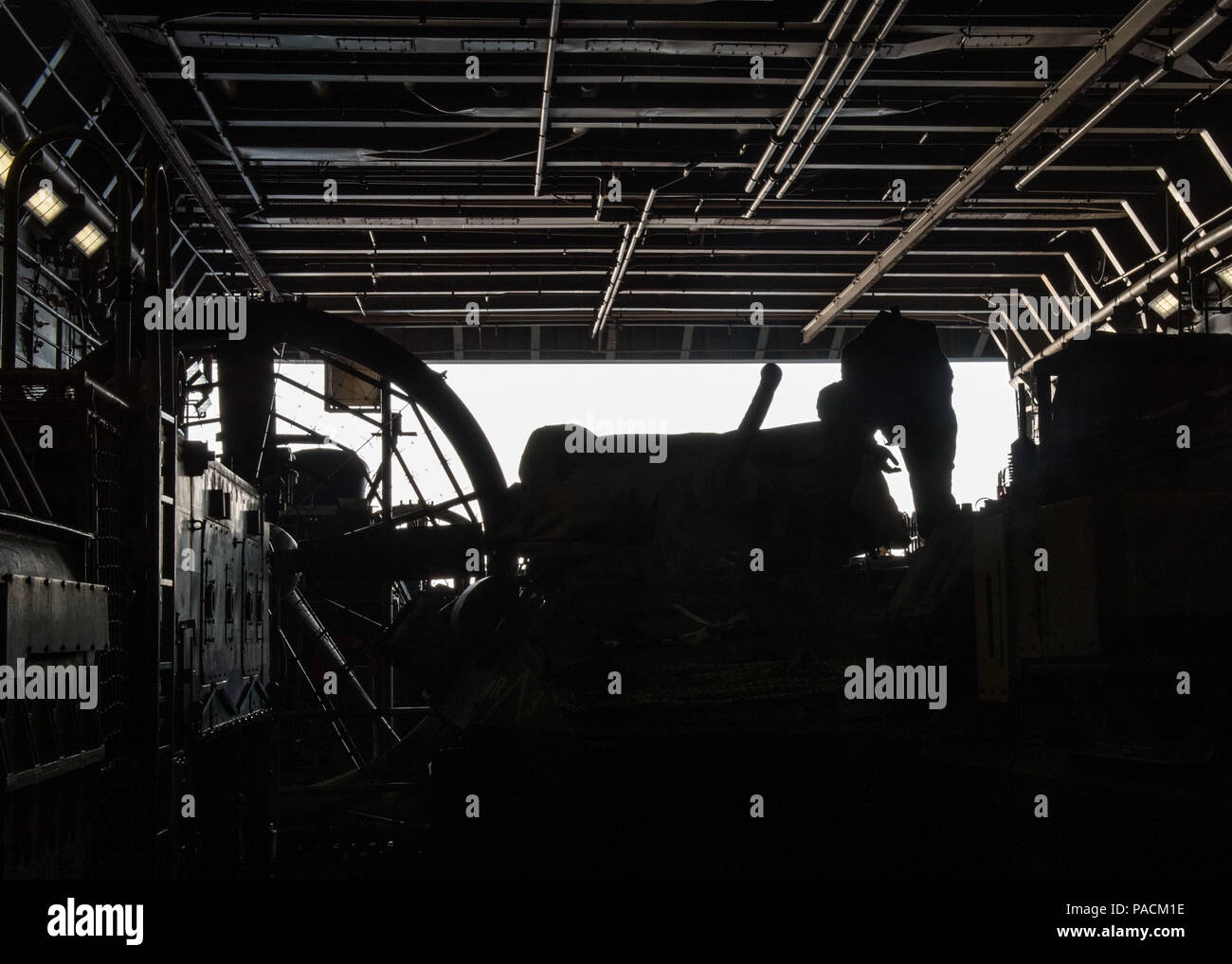 160317-N-GR718-002 EAST SEA (March 17, 2916) A Marine climbs onto a tank in preparation for departing amphibious transport dock ship USS New Orleans (LPD 18) on a landing craft air cushion (LCAC). USS New Orleans is assigned to the Boxer Amphibious Ready Group and is participating in Exercise Ssang Yong 2016. Ssang Yong is a biennial combined exercise conducted by forward deployed U.S. Forces with the Republic of Korea Navy and Marine Corps, Australian Army and Royal New Zealand Army Forces in order to strengthen our interoperability and working relationships across a wide range of military op Stock Photo