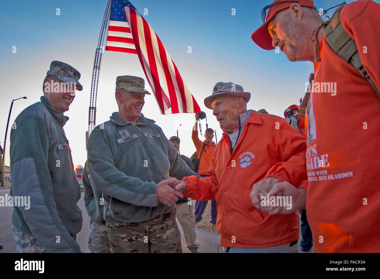 U.S. Army Brig. Gen. Timothy R. Coffin, commander of White Sands Missile Range, greets retired Col. Ben Skardon, 98, a survivor of the Bataan Death March, before the start of the 27th annual Bataan Memorial Death March, March 20, 2016. Skardon is the only survivor who walks in the march, going more than eight miles nine years in a row. (U.S. Army photo by Staff Sgt. Ken Scar) Stock Photo