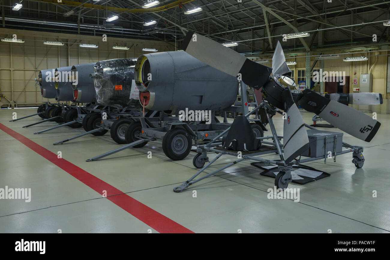 Multiple quick engine change kits and a propeller wait to be inspected