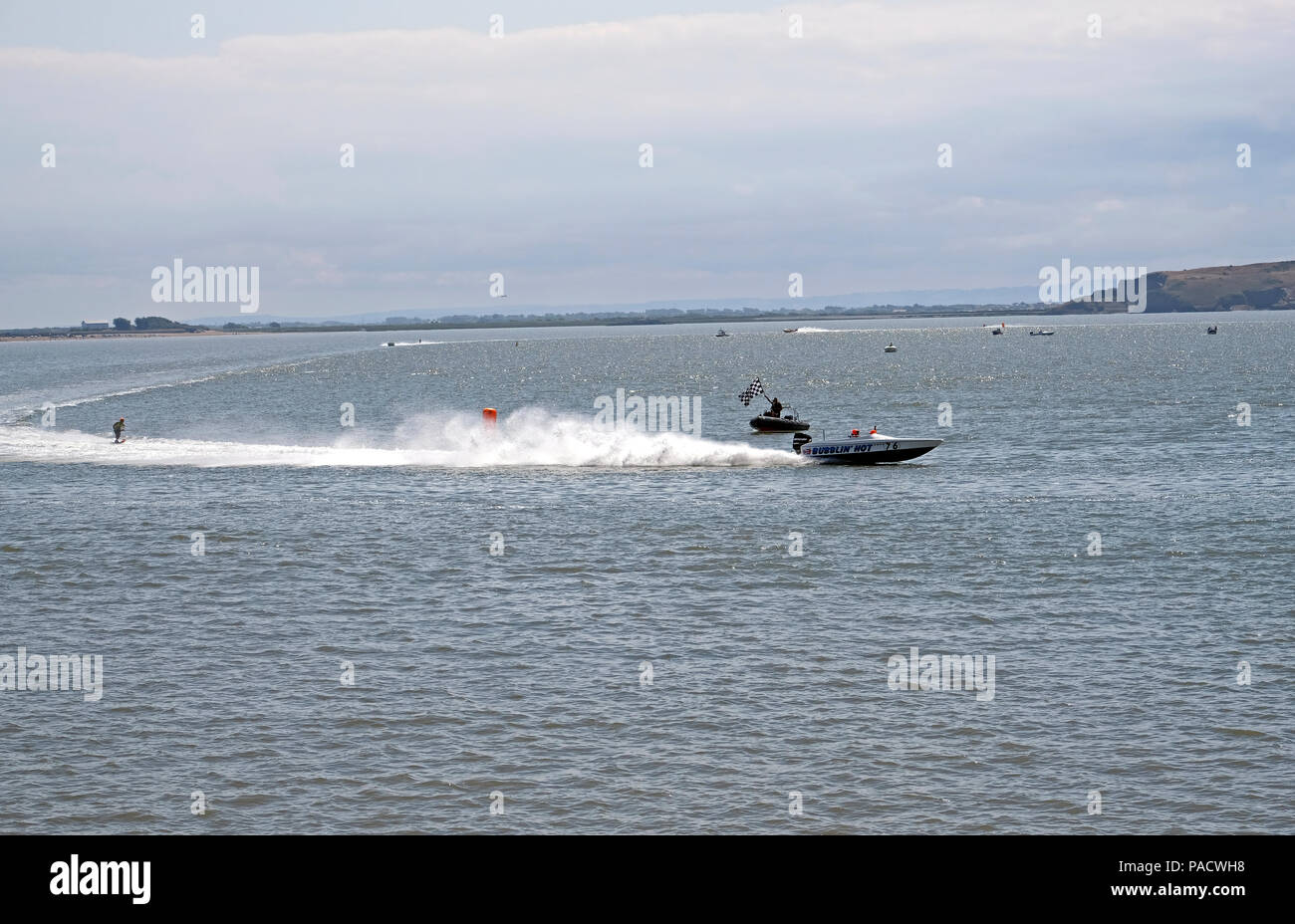 Weston-super-Mare, UK. 21st July, 2018. Waterskiers race around the bay. This regional Formula 2 race was organised by Weston Bay Watersports Club. Keith Ramsey/Alamy Live News Stock Photo