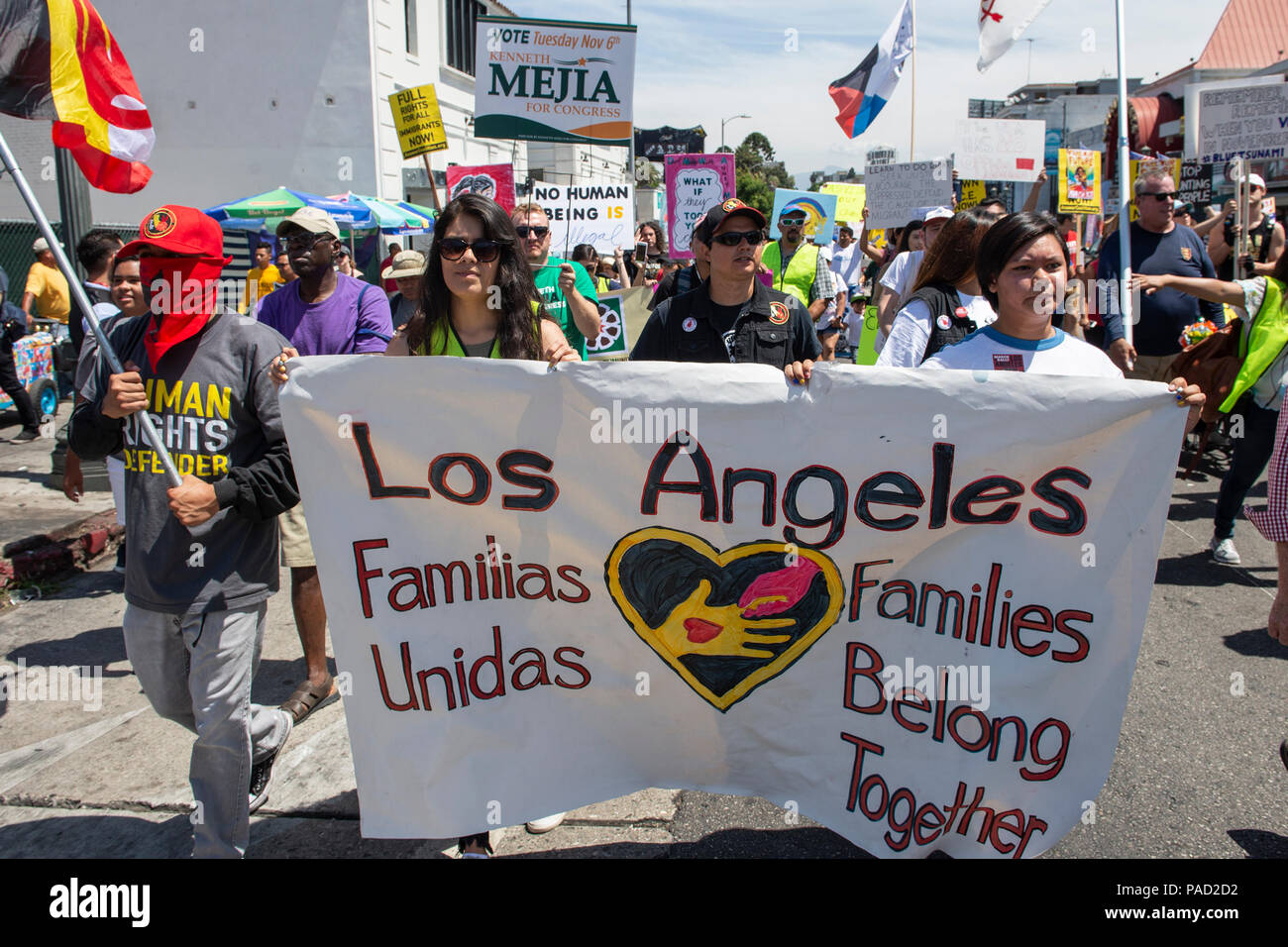 Los Angeles, USA. 21 July 2018.  Families Belong Together Banner and protesters during march and ICE (Immigration and Customs Enforcement protest in Los Angeles, California on July 21, 2018. Despite the ending of family separations at US borders many children that were taken away from their parents are still not re-united with their families. Credit: Aydin Palabiyikoglu Credit: Aydin Palabiyikoglu/Alamy Live News Stock Photo