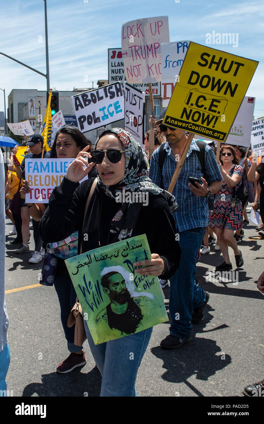 Los Angeles, USA. 21 July 2018.  A Msul'm woman from Orange County Neha Syed march with protestors for supporting them against Trump's policies and against Muslim Ban during Families Belong Together March and ICE (Immigration and Customs Enforcement protest in Los Angeles, California on July 21, 2018. Despite the ending of family separations at US borders many children that were taken away from their parents are still not re-united with their families. Credit: Aydin Palabiyikoglu Credit: Aydin Palabiyikoglu/Alamy Live News Stock Photo