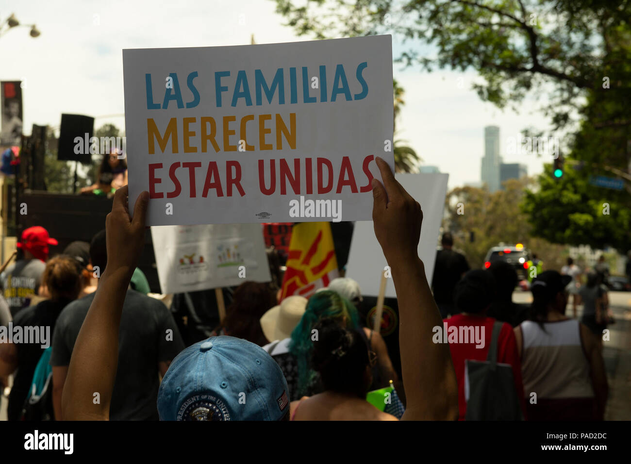 Los Angeles, USA. 21 July 2018.  Families Belong Together March and ICE (Immigration and Customs Enforcement protest in Los Angeles, California on July 21, 2018. 'Fam'l'es Belongs Together' can be read on sign in Spanish. Despite the ending of family separations at US borders many children that were taken away from their parents are still not re-united with their families. Credit: Aydin Palabiyikoglu Credit: Aydin Palabiyikoglu/Alamy Live News Stock Photo
