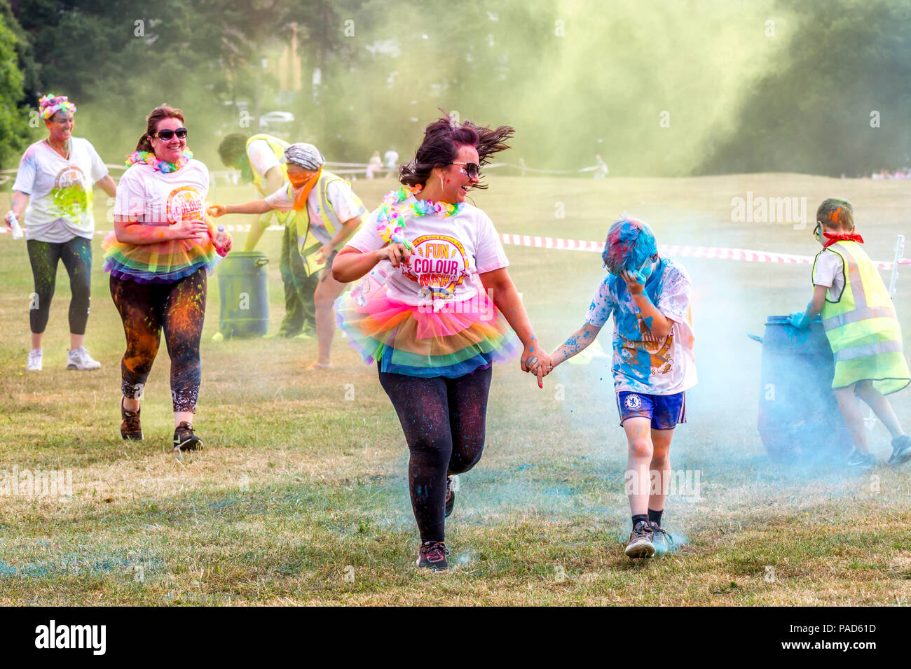Abington Park, Northampton, U.K. 22nd July 2018. Fun Colour Rush, family event with over 3000 people entered this year raising money for 3 different charities, the organisers had to swap the venue twice because of Travellers on Abington Park up until yesterday lunchtime, after they were removed they went onto the new venue site, so it had to be swapped back again at the last minute. Credit:  Keith J Smith./Alamy Live Stock Photo