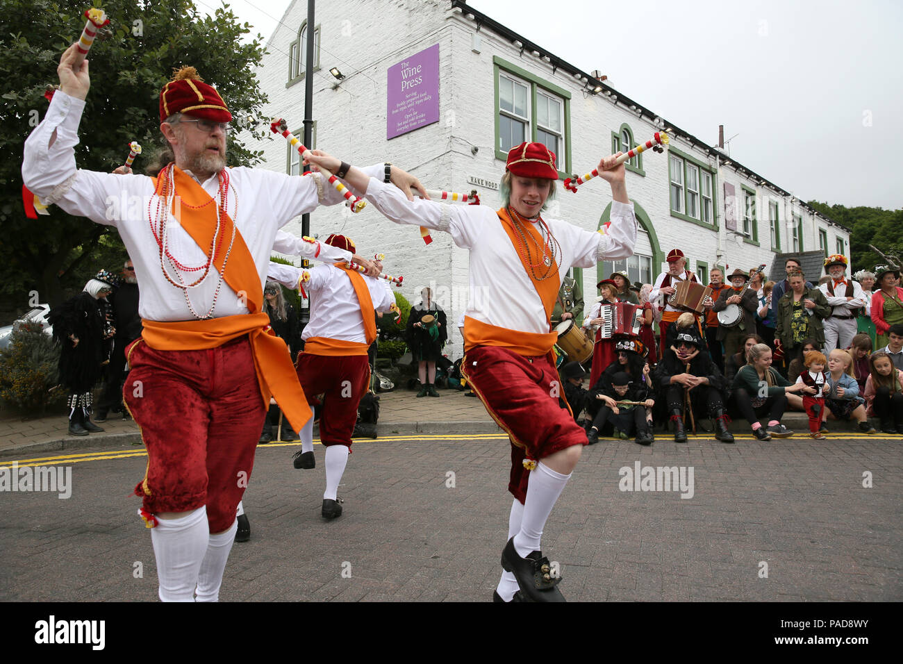 Littleborough, UK. 22nd July, 2018. Horwich folk dancers at the annual Rushbearing festival reviving the tradition of carrying the rushes to the local church dating back to a time when the church floors where earthen and the rushes were used to cover them for insulation. Littleborough,22nd July, 2018 (C)Barbara Cook/Alamy Live News Credit: Barbara Cook/Alamy Live News Stock Photo