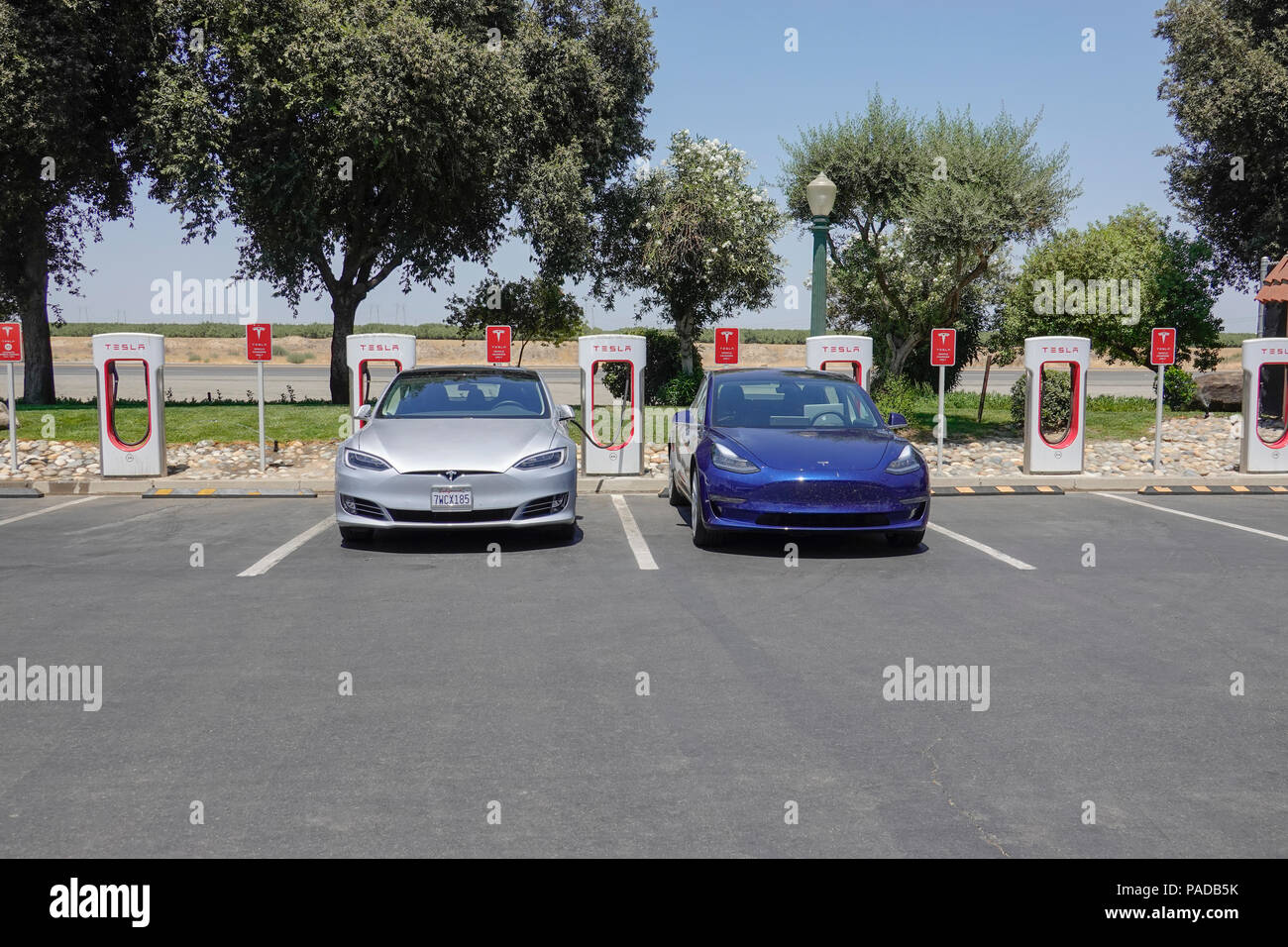 Tesla Supercharging Stations at Harris Ranch, a popular stop over on Interstate 5 in California's Central Valley. Stock Photo