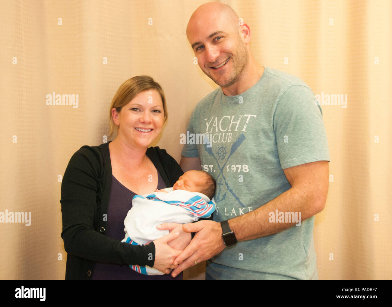 Kristy Goldberg, a native of Delanco, New Jersey, holds newborn son, Kaleb,  along with husband Maj. Michael Goldberg, gastroenterologist, William  Beaumont Army Medical Center, and native of Wynnewood, Pennsylvania, prior  to discharge