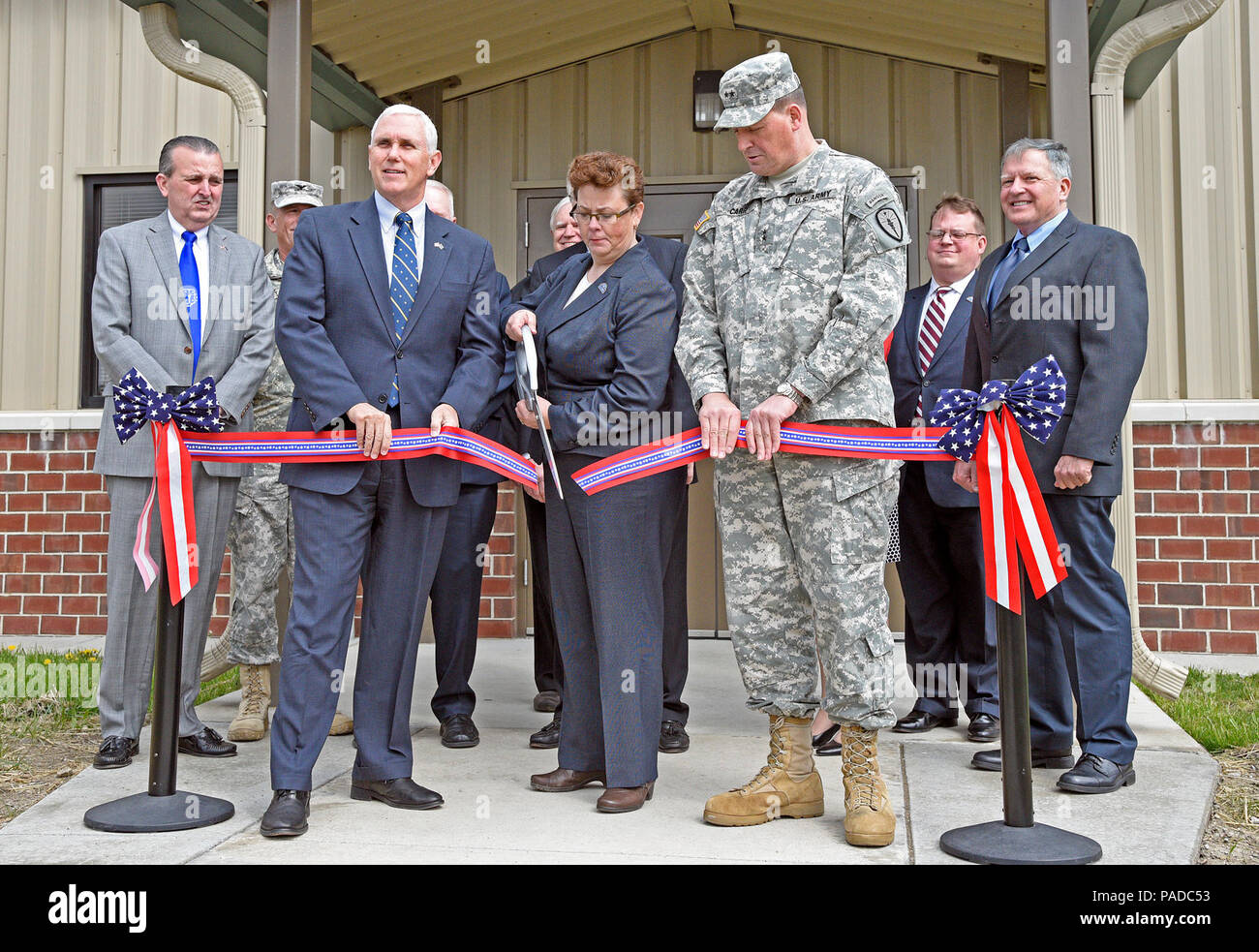 Dr Ginny Creasman Acting Director Of The Richard L Roudebush Va Medical Center Cuts The Ceremonial Ribbon As Indiana Governor Mike Pence On Her Right And Maj Gen Courtney P Carr Indiana