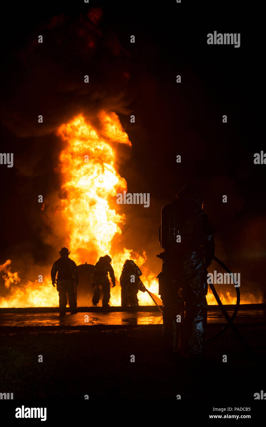 Marines With Aircraft Rescue Fire Fighting Extinguish A Fuel Fire