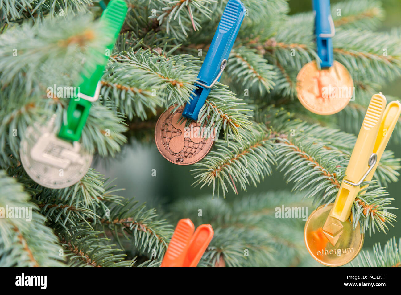 Christmas tree decorated with crypto currency. On the green Christmas tree,  the coins are crypto-currency. Decoration in the Digital Age Stock Photo -  Alamy