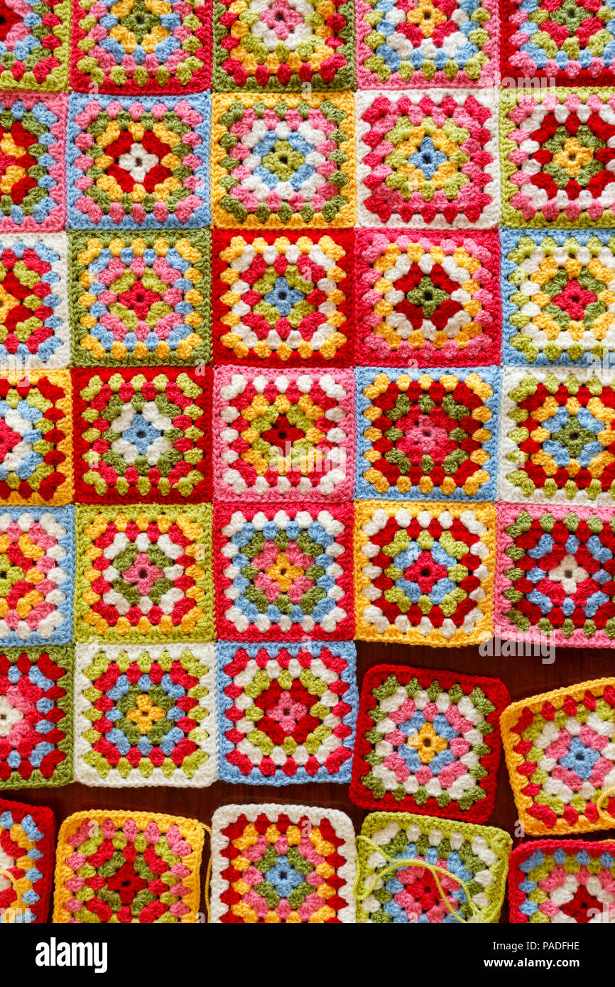 Brightly Coloured Granny Square Woollen Baby Blanket Traditional Hand Made Crochet Home Handicraft Squares Being Stitched Together Stock Photo Alamy