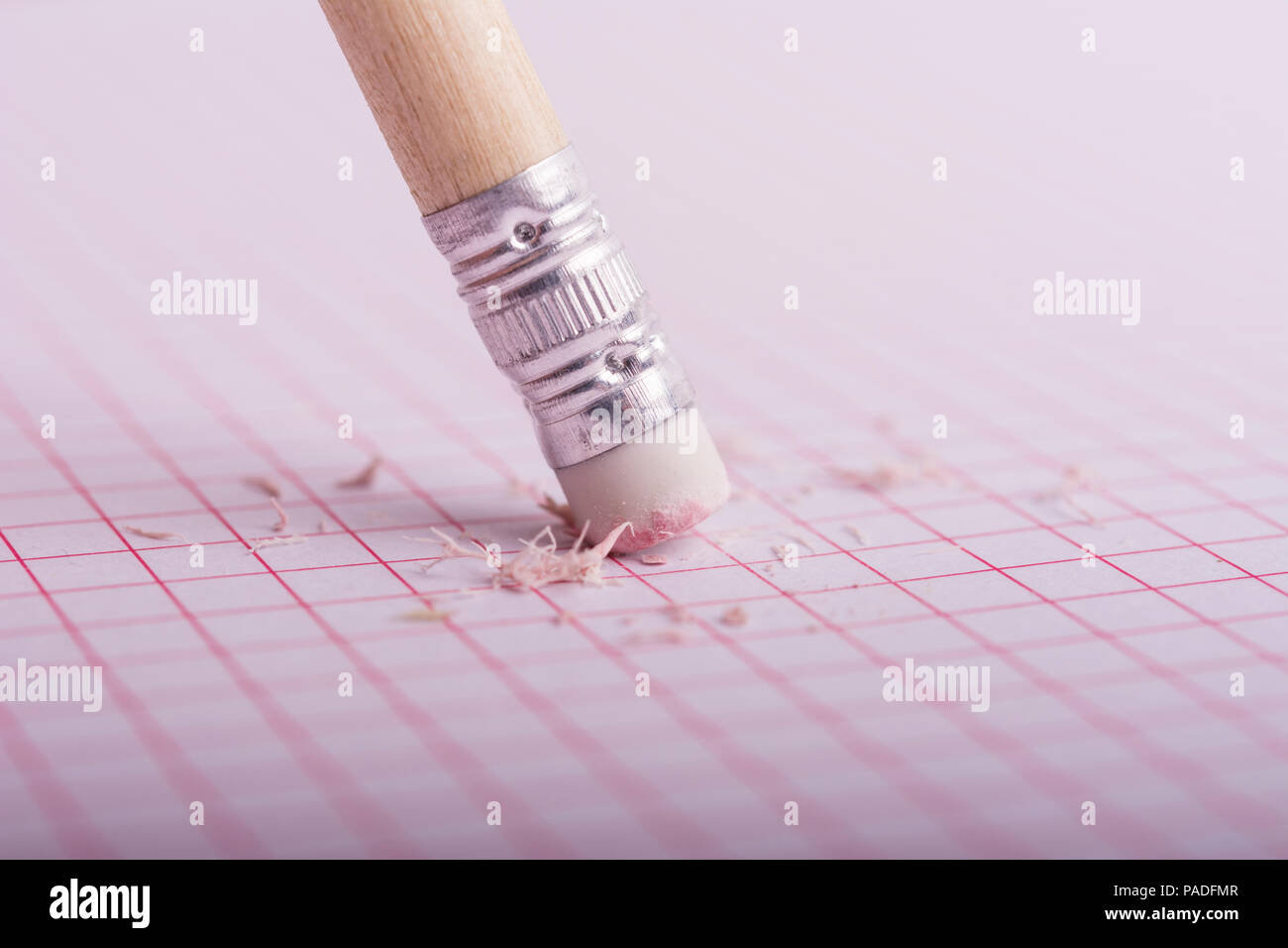 Pencil rubber erasing on a grid sheet Stock Photo Alamy