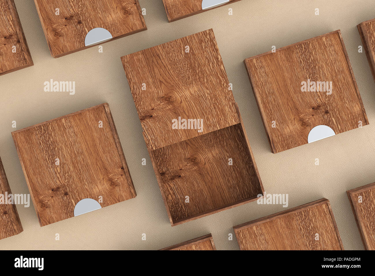Empty dark wooden square box with opened sliding lid with closed boxes ...