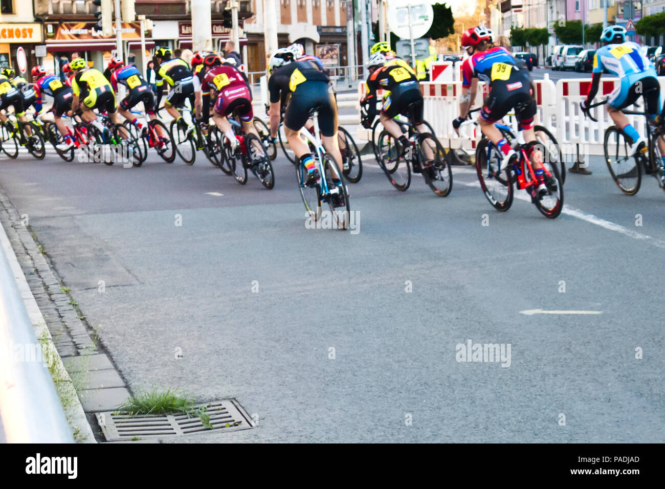 cyclists sprinting during a road bicycle racing in the city streets Stock Photo