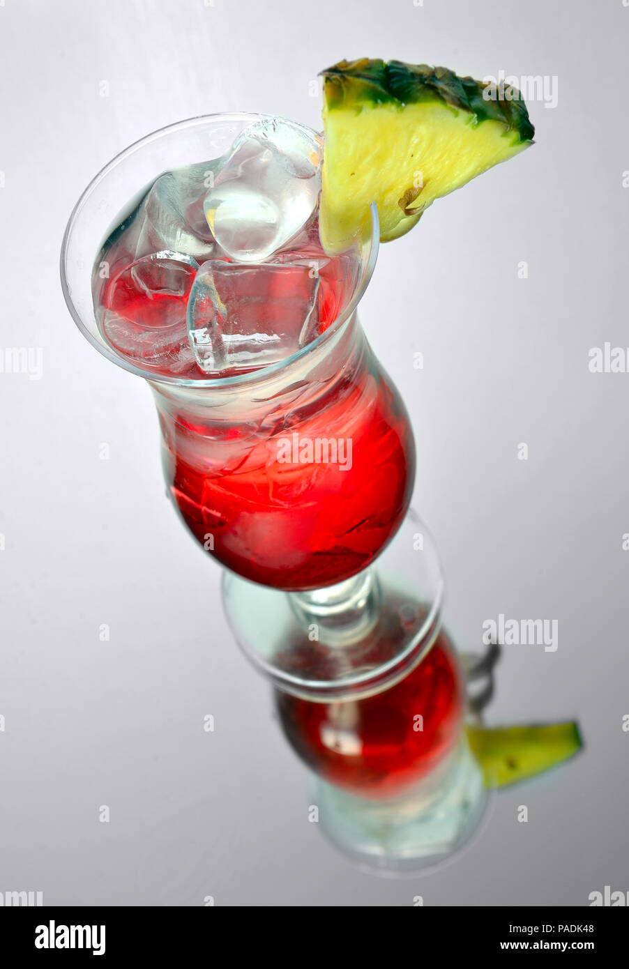 iced rum cocktail with pineapple on grey Stock Photo Alamy