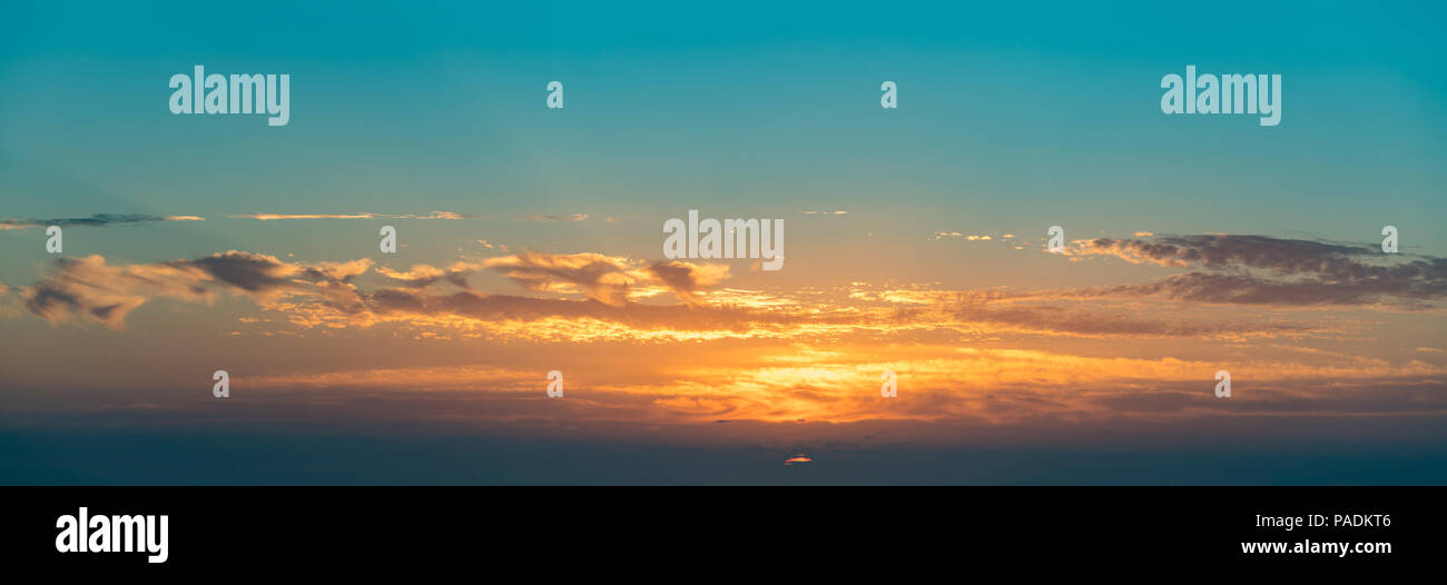 Dramatic sunset sky with clouds Stock Photo - Alamy