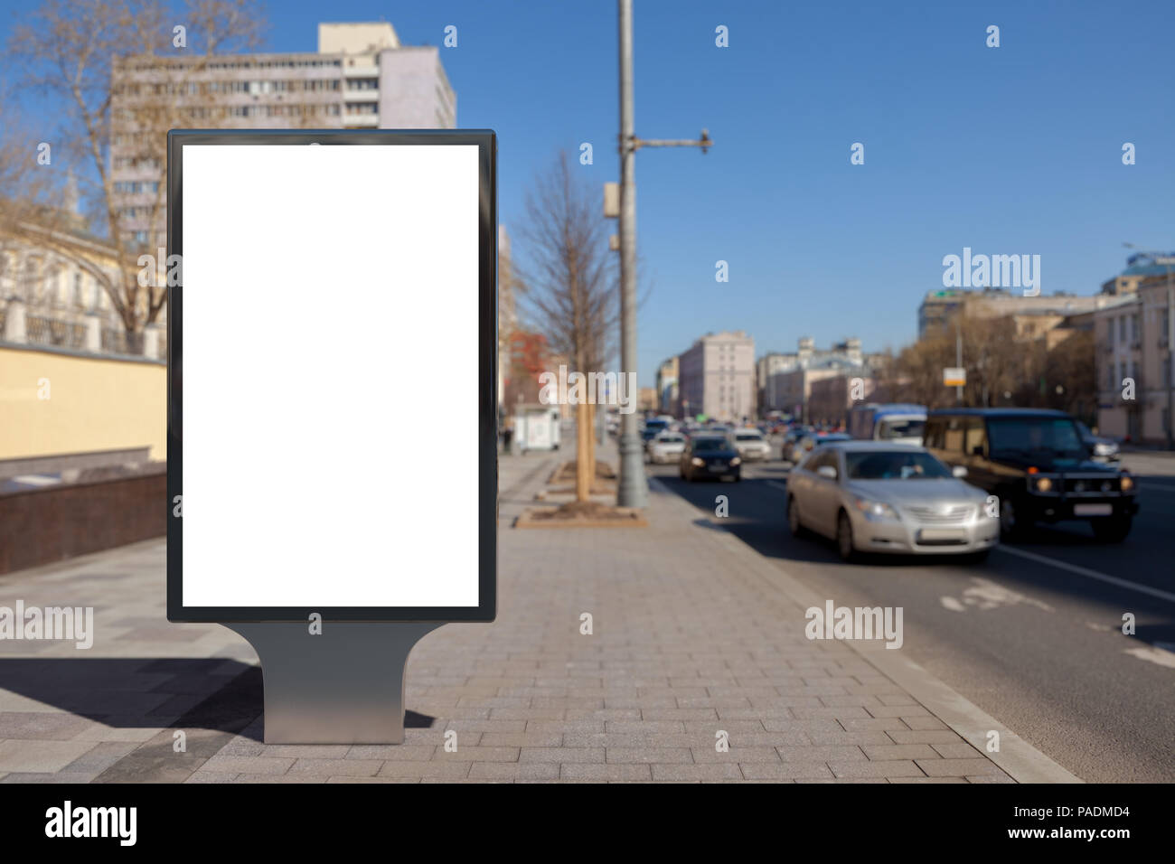 Blank street billboard poster stand on city background Stock Photo - Alamy