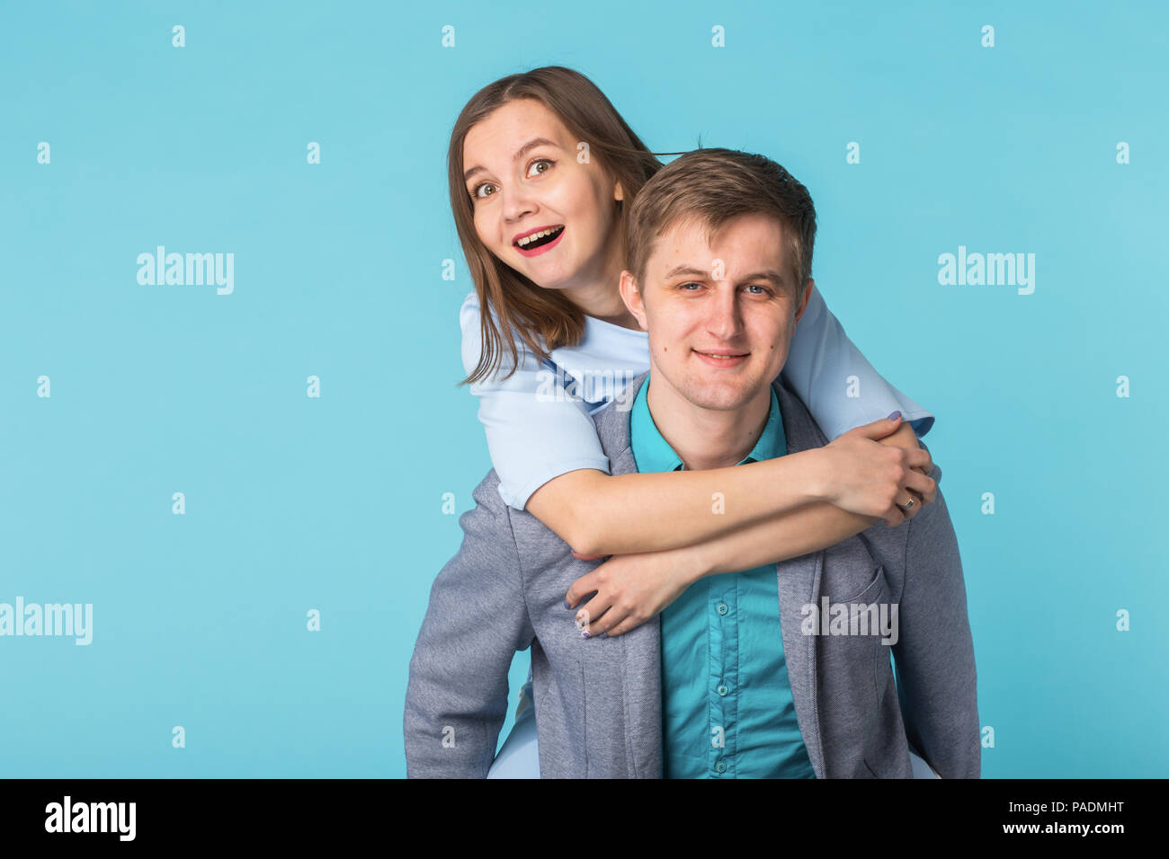 Funny young couple in studio shoot Stock Photo - Alamy