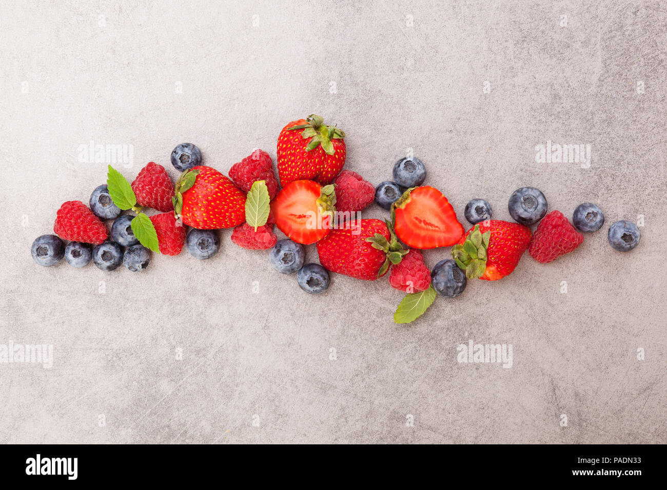 Delicious berries. Strawberries, blueberries and raspberries. Healthy summer fruits