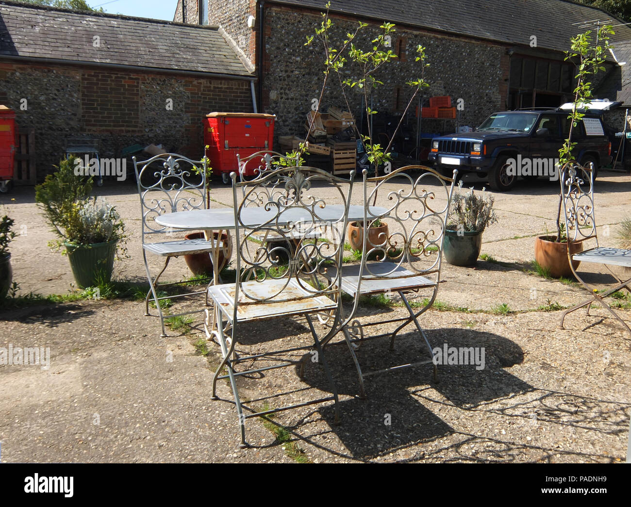 Outdoor seating area for rundown neglected cafe Stock Photo