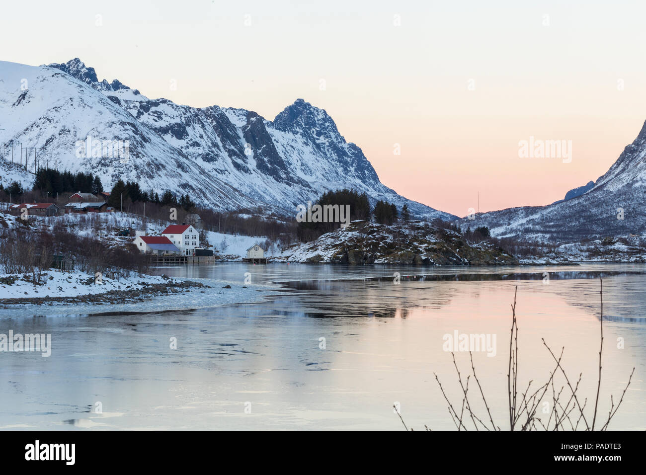 The fjord and mountains surrounding Vestpolloya near Sildpollnes, Nordland, Norway Stock Photo