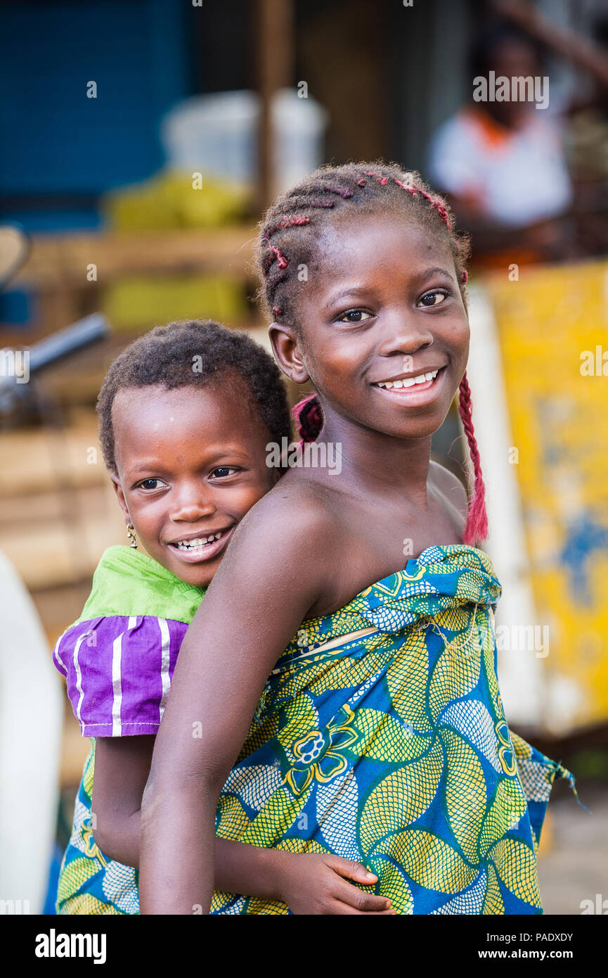 PORTONOVO, BENIN MAR 10, 2012 Unidentified Beninese girl carries