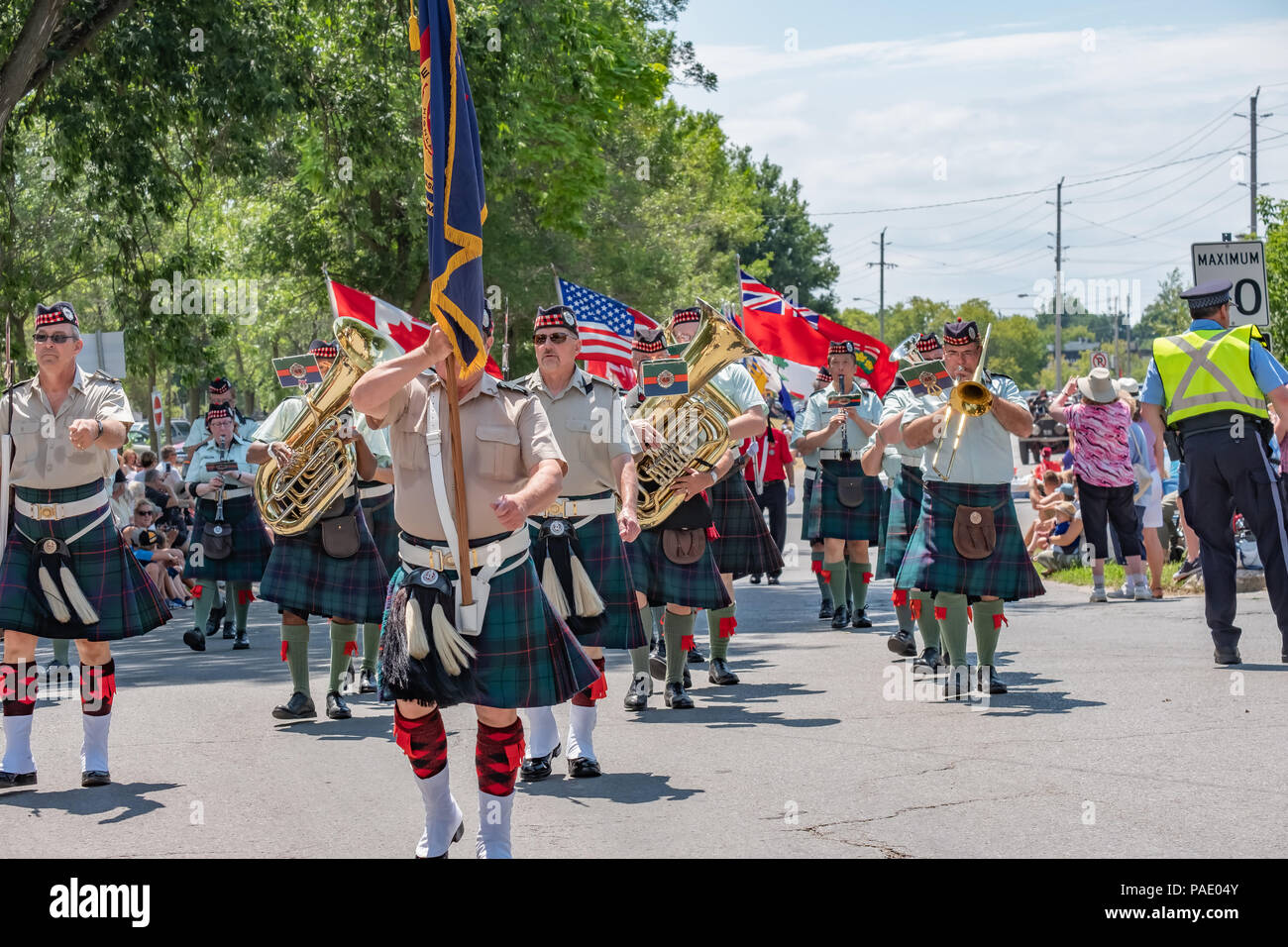The 48th Highlanders of Canada Militry Band marches in the 41st Annual