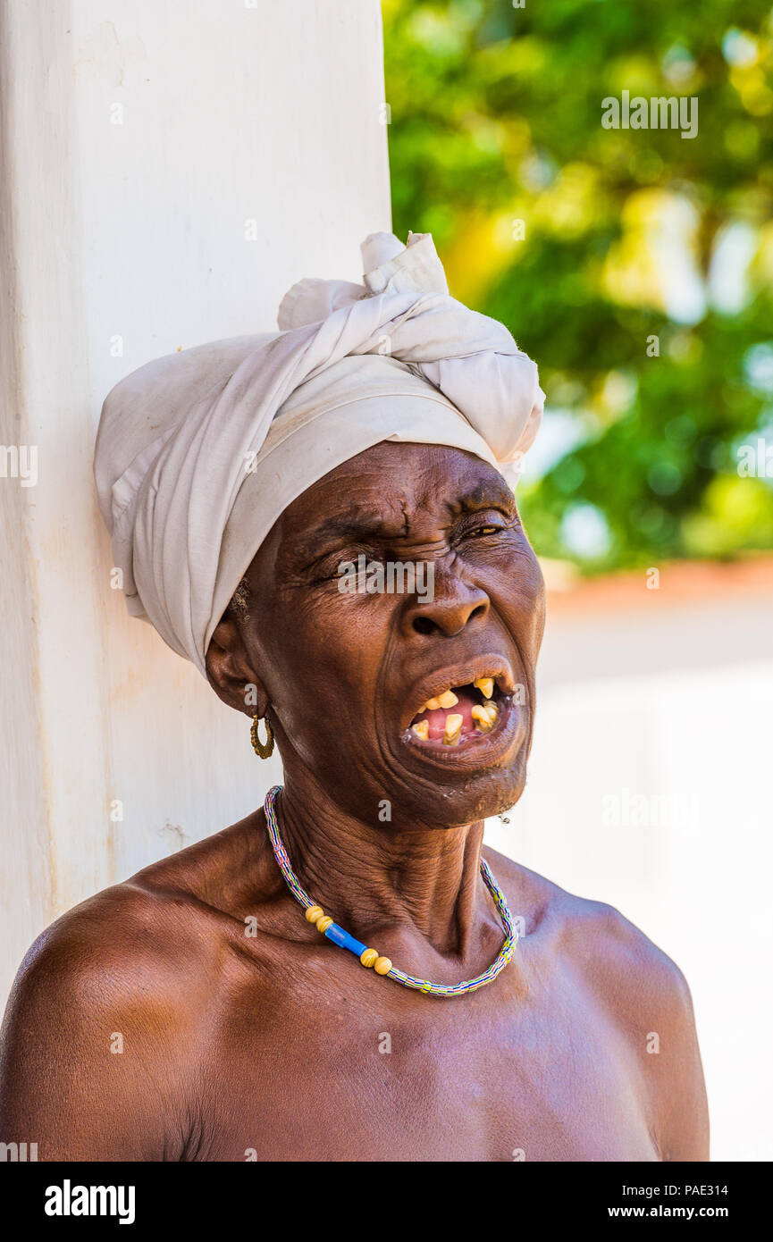 KARA, TOGO - MAR 9, 2013: Unidentified Togolese angry toothless woman portrait. People in Togo suffer of poverty due to the unstable econimic situatio Stock Photo