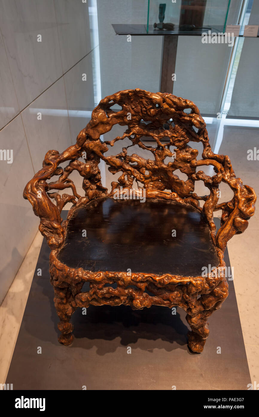 Carved wooden chair (1736-1795) from Quing dynasty, China, reign of Qianlong Emperor, Museum of Asian Arts - Musee des Arts Asiatiques in Nice, France Stock Photo