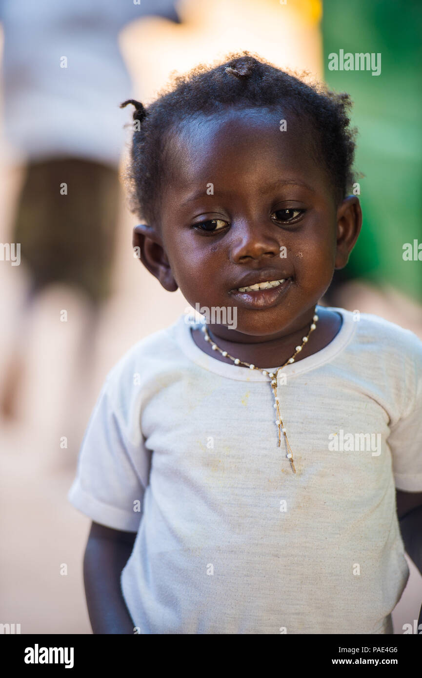BANJUL, GAMBIA - MAR 14, 2013: Unidentified Gambian beautiful little