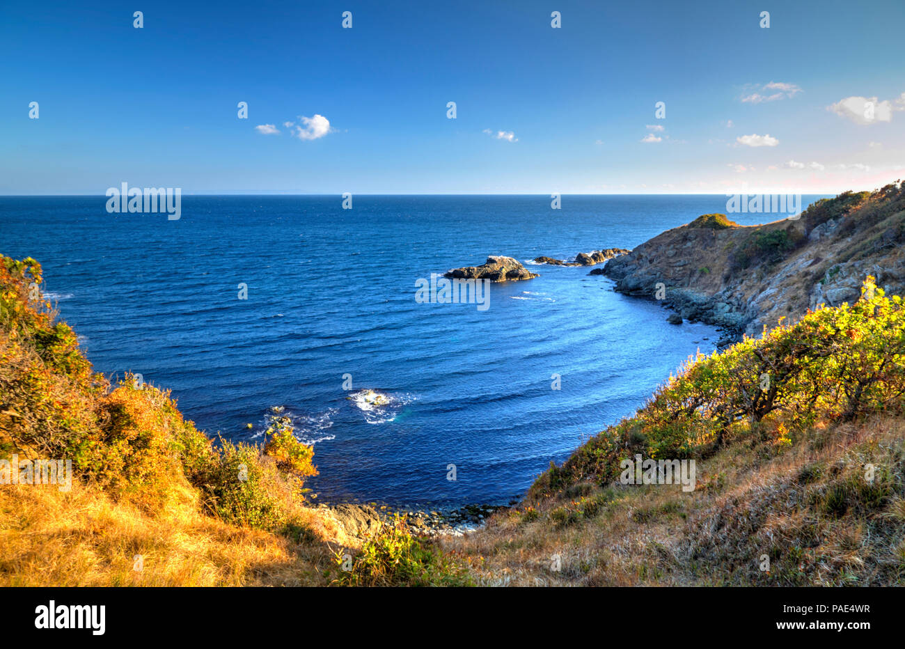 Beautiful landscape on rocky shore Stock Photo - Alamy