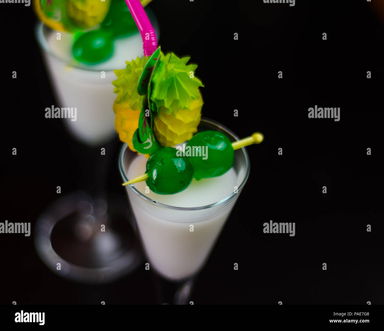 exotic drink based on rum and other ingredients, cocktail prepared by