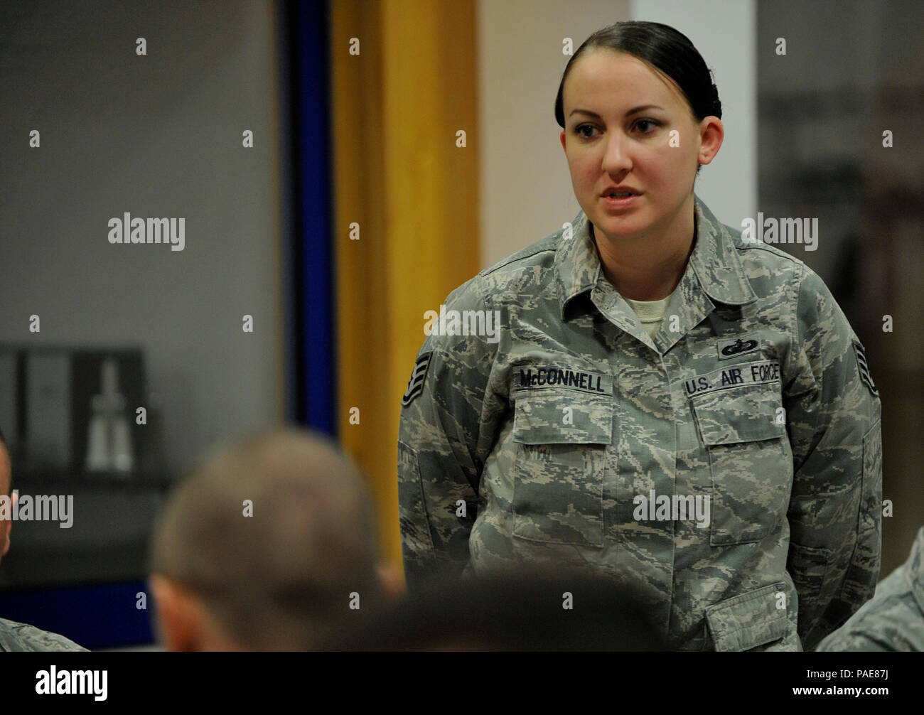 Staff Sgt. Kathleen McConnell, 700th Contracting Squadron contracting officer, asks a question during an enlisted breakfast with Chief Master Sgt. Phillip L. Easton, 86th Airlift Wing command chief, at Kapaun Air Station, Germany. McConnell asked Easton about how to become a better supervisor and encourage Airmen to take initiative. (U.S. Air Force photo/Airman 1st Class Larissa Greatwood) Stock Photo