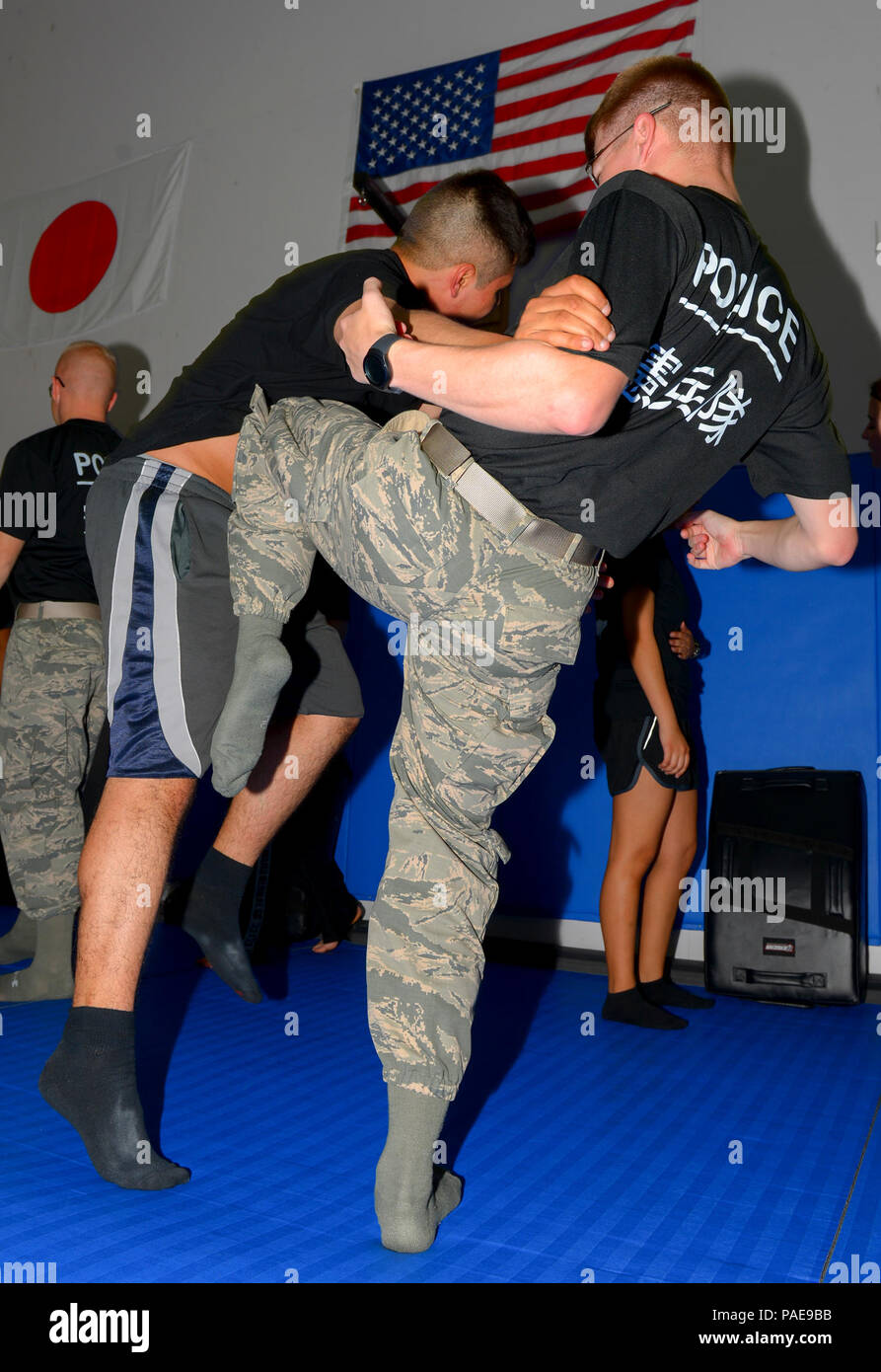 Students practice Krav Maga techniques at Yokota Air Base, Japan, March 18,  2016. The 374th Airlift Wing Women's History Month committee sent an open  invitation to all base members interested in learning