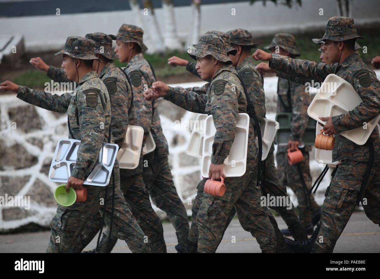 Guatemalan army recruits march after dinner at the basic training base that also serves as a holding base for Operation Beyond The Horizon at  Guatemala City, Guatemala, March 26, 2016. Beyond The Horizon is an annual humanitarian mission held in different South American Countries, where U.S. service members build schools and provide free medical access to the local population. (U.S. Army photo by Sgt. Prosper Ndow) Stock Photo