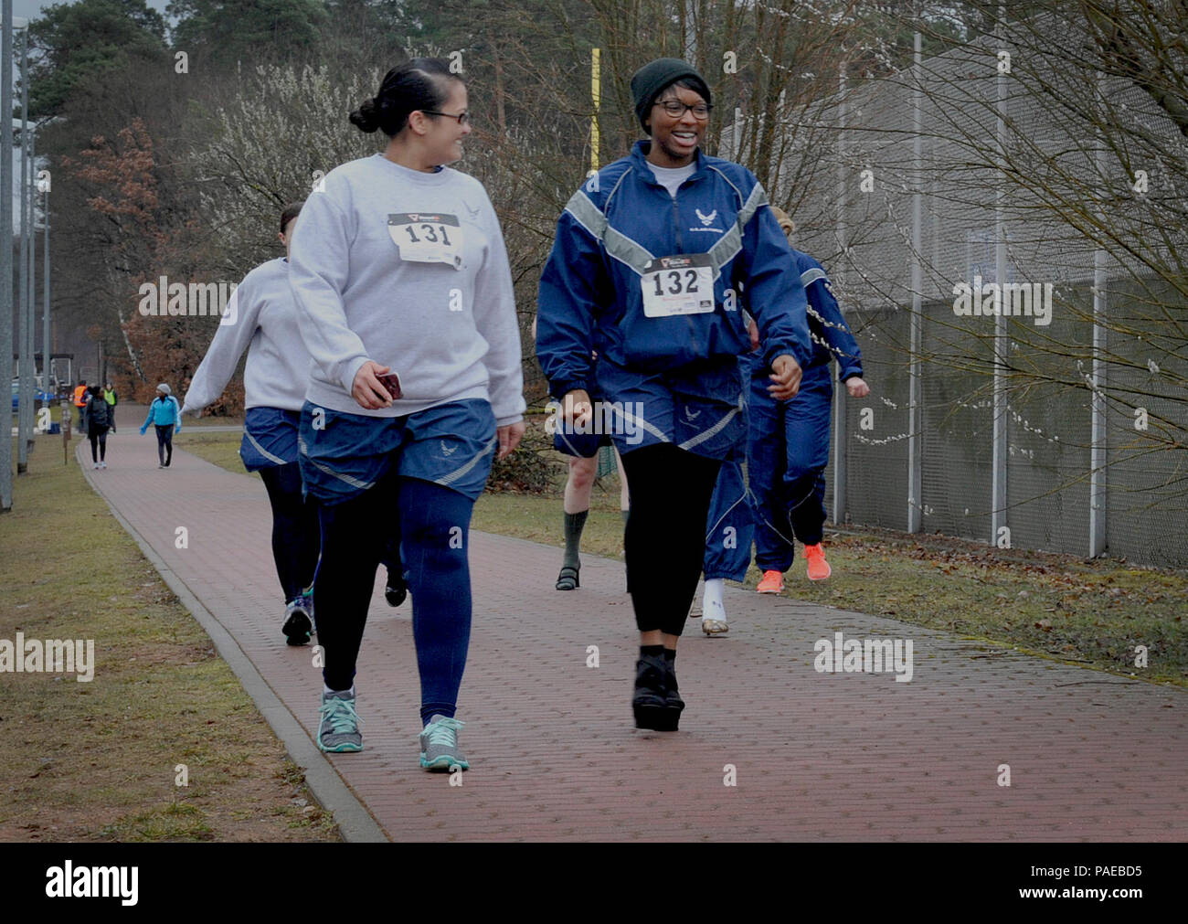 Airmen participate in the first One Mile Walk in Her Heels and 5K Run March 25, 2016, at Ramstein Air Base, Germany. The event raised awareness about sexualized violence against women. (U.S. Air Force photo/Airman 1st Class Larissa Greatwood) Stock Photo