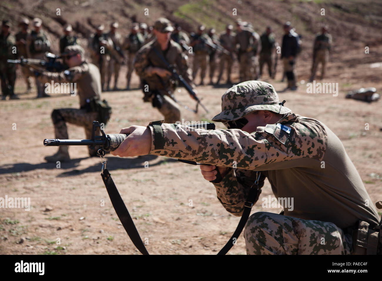 Finnish instructors demonstrate to Peshmerga soldiers how to move under ...