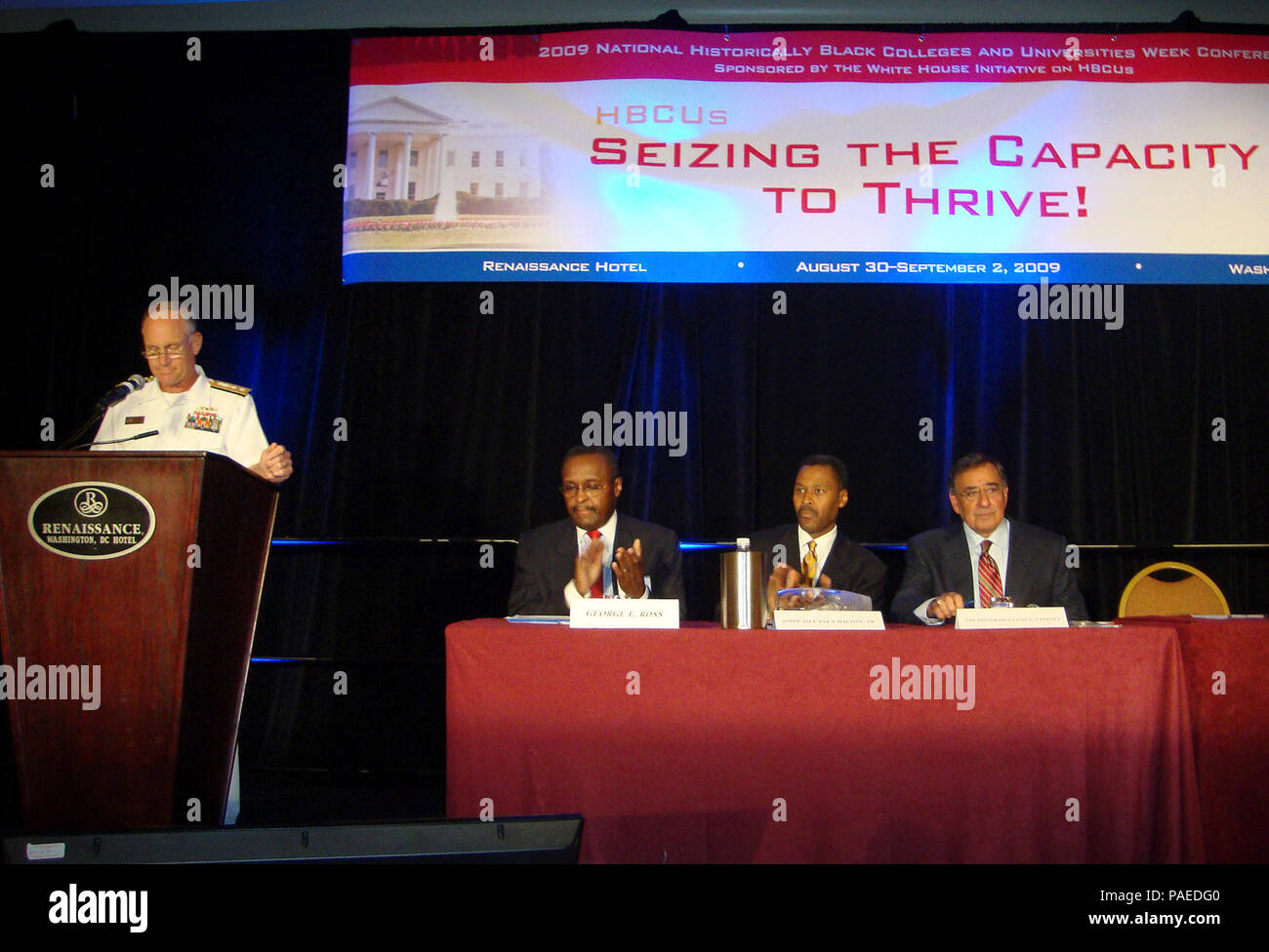 Rear Adm. Nevin P. Carr Jr., chief of Naval Research, addresses attendees at the 2009 National Historically Black Colleges and Universities Week Conference. Carr advocated outreach to grade school, undergraduate, graduate and post graduate students in order to maintain the health of the defense science and engineering workforce. Pictured on the dais with Carr are Dr. George E. Ross, president of Alcorn State University; Dr. John S. Wilson Jr., executive director of the White House Initiative on Historically Black Colleges and Universities; and Leon Panetta, director of the Central Intelligence Stock Photo