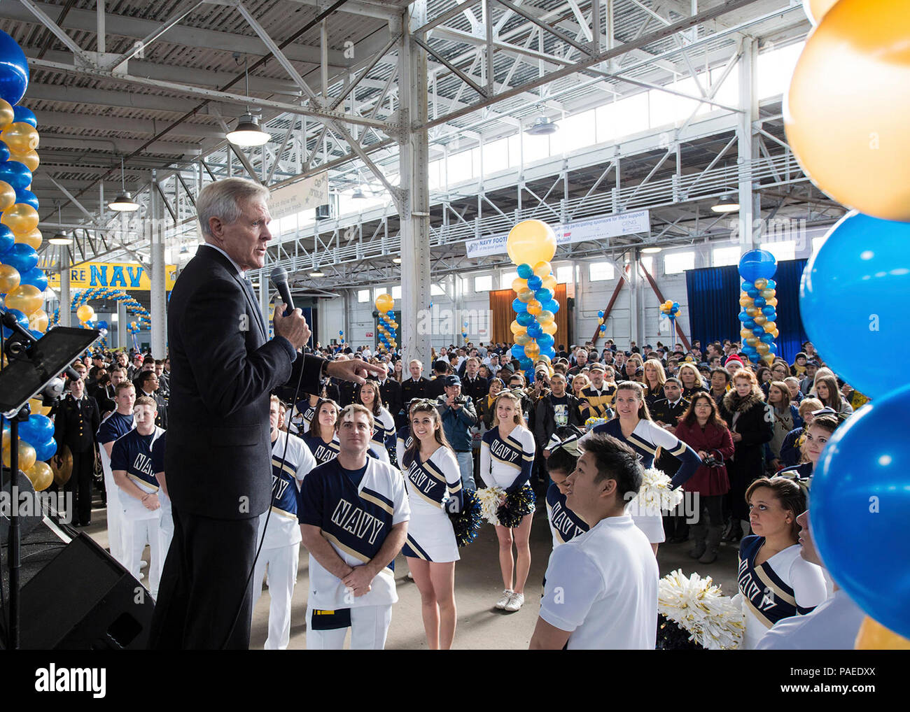SAN FRANCISCO (Dec. 29, 2012) Secretary of the Navy (SECNAV) the Honorable Ray Mabus speaks to the U.S. Naval Academy cheerleading squad and the Navy mascot, 'Bill the Goat,' during a pep rally for the Kraft Fight Hunger Bowl game between the U.S. Naval Academy and Arizona State at AT&T Park, San Francisco, California. Arizona State defeated Navy 62-28. Stock Photo