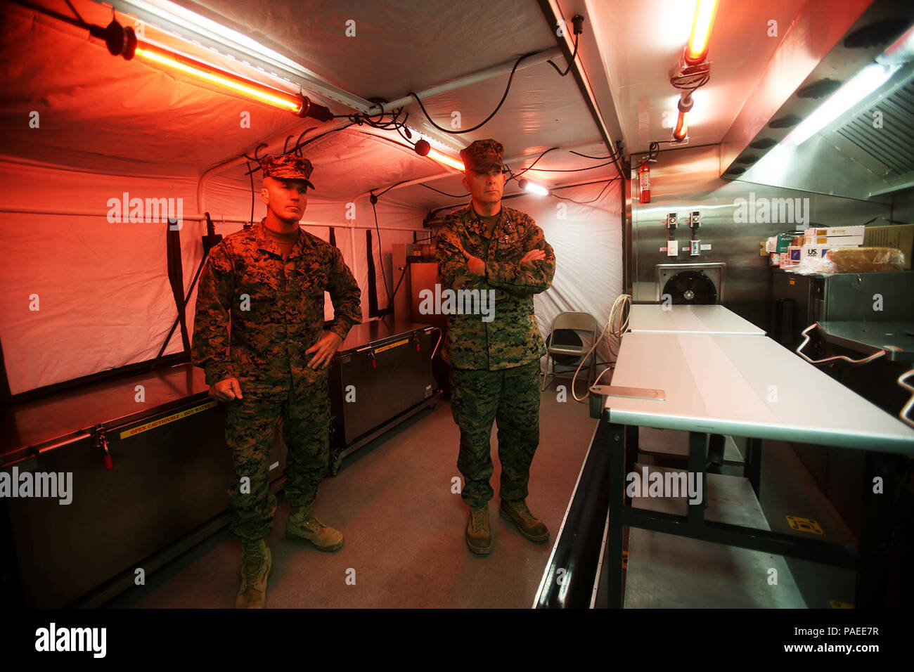 U.S. Marines Lt. Gen. David H. Berger and Sgt. Maj. Bradley Kasal learn about the expeditionary