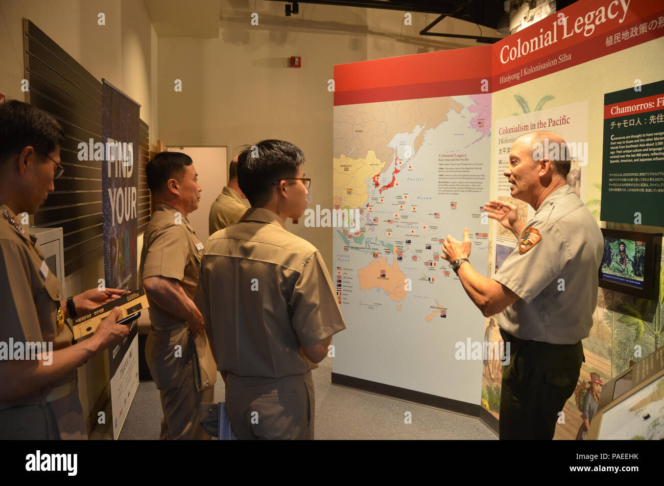 160331-N-YM720-223 SANTA RITA, Guam (March 31, 2016) Jim Richardson, superintendent of the War in the Pacific Museum, right, leads members of the U.S. and ROKN submarine forces through a tour of the War in the Pacific Museum after the first day of the 43rd Submarine Warfare Committee Meeting (SWCM). SWCM is a bilateral discussion between the U.S. and ROKN submarine forces designed to foster the partnership and focuses on submarine tactics, force integraton and future submarine development. (U.S. Navy photo by MC3 Allen McNair/Released) Stock Photo