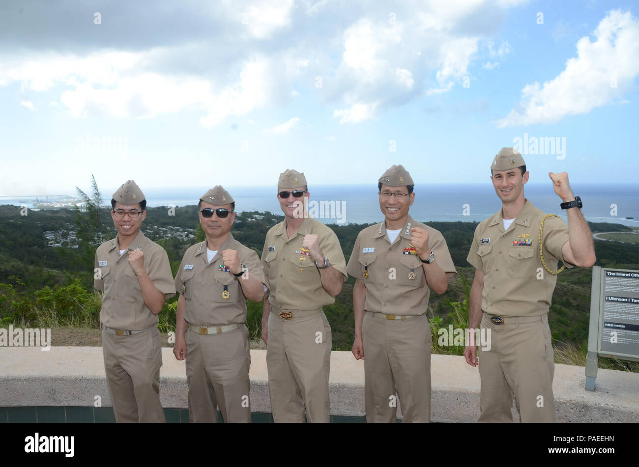 160331-N-YM720-239 SANTA RITA, Guam (March 31, 2016) Members of the U.S. and Republic of Korea (ROK) submarine forces pose at the Asan Bay Overlook on Nimitz Hill after the first day of the 43rd Submarine Warfare Committee Meeting (SWCM). SWCM is a bilateral discussion between the U.S. and ROKN submarine forces designed to foster the partnership and focuses on submarine tactics, force integraton and future submarine development. (U.S. Navy photo by MC3 Allen McNair/Released) Stock Photo