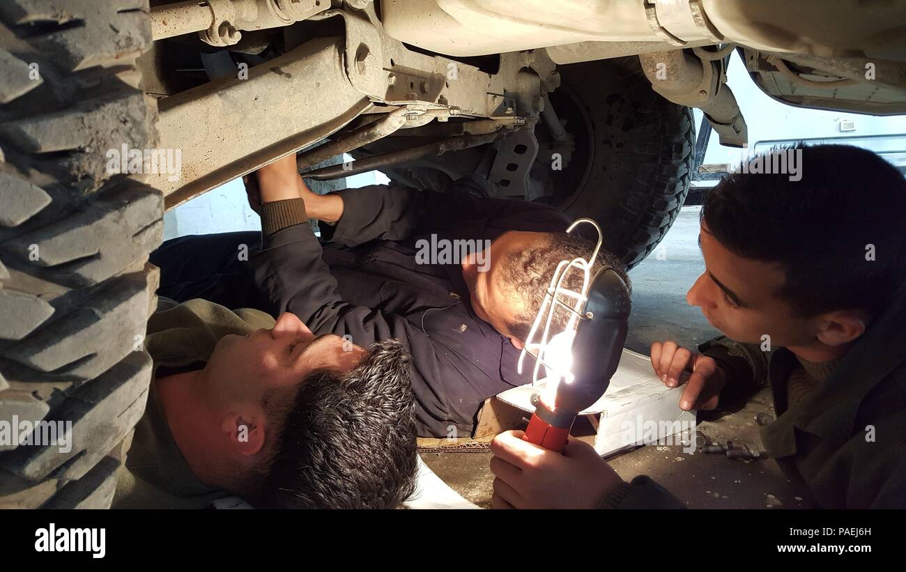 Sgt. Doug Lancie, a motor transportation mechanic, works with a