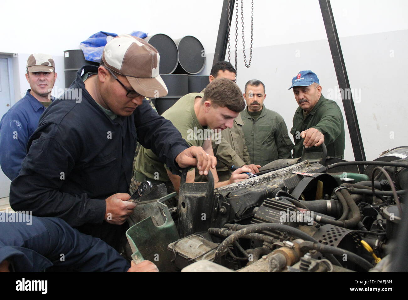 Cpl. Josh Sizelove, a motor transportation mechanic, works with