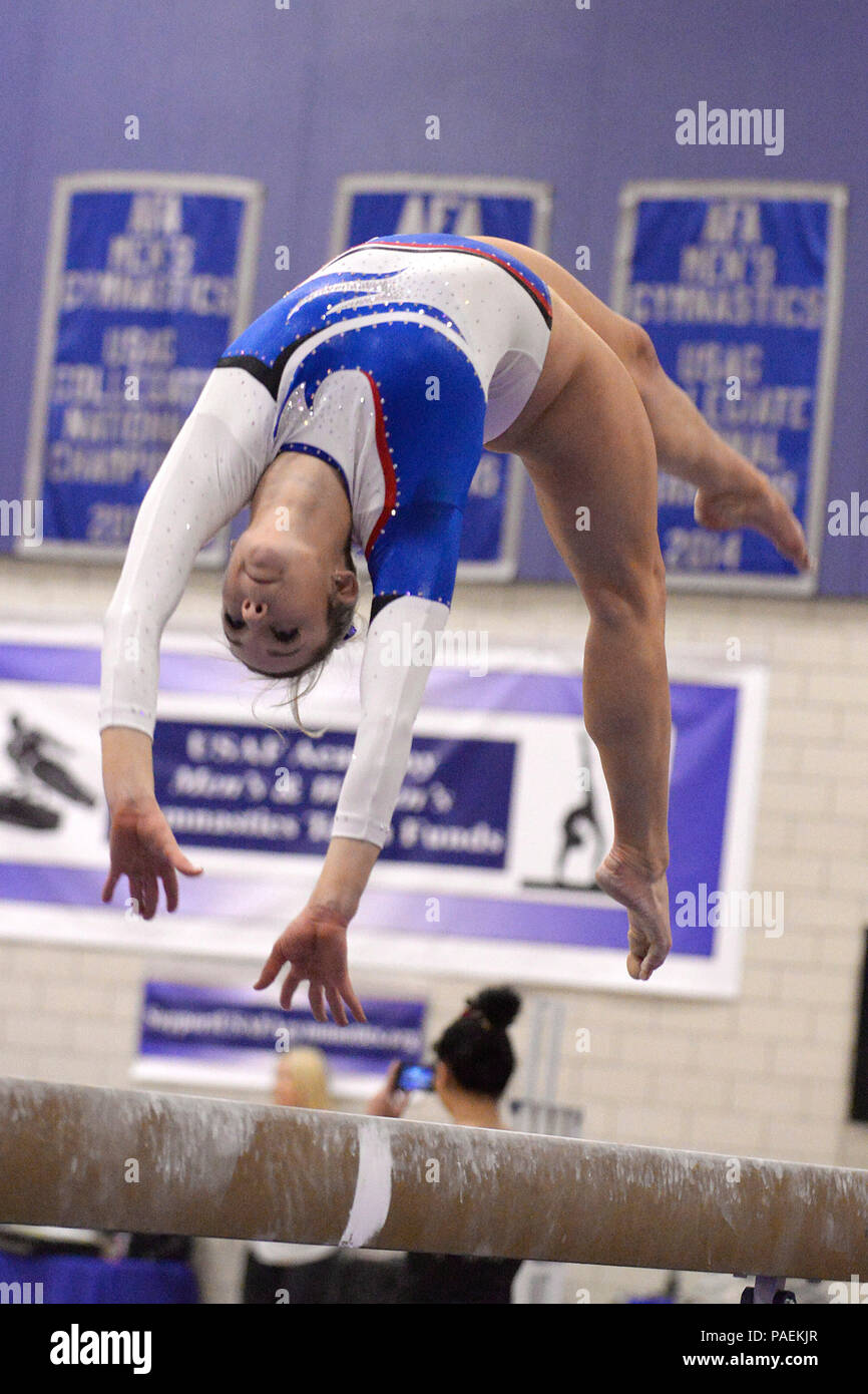 Chelsea Grimison, a sophomore, performs on the balance beam as the U.S