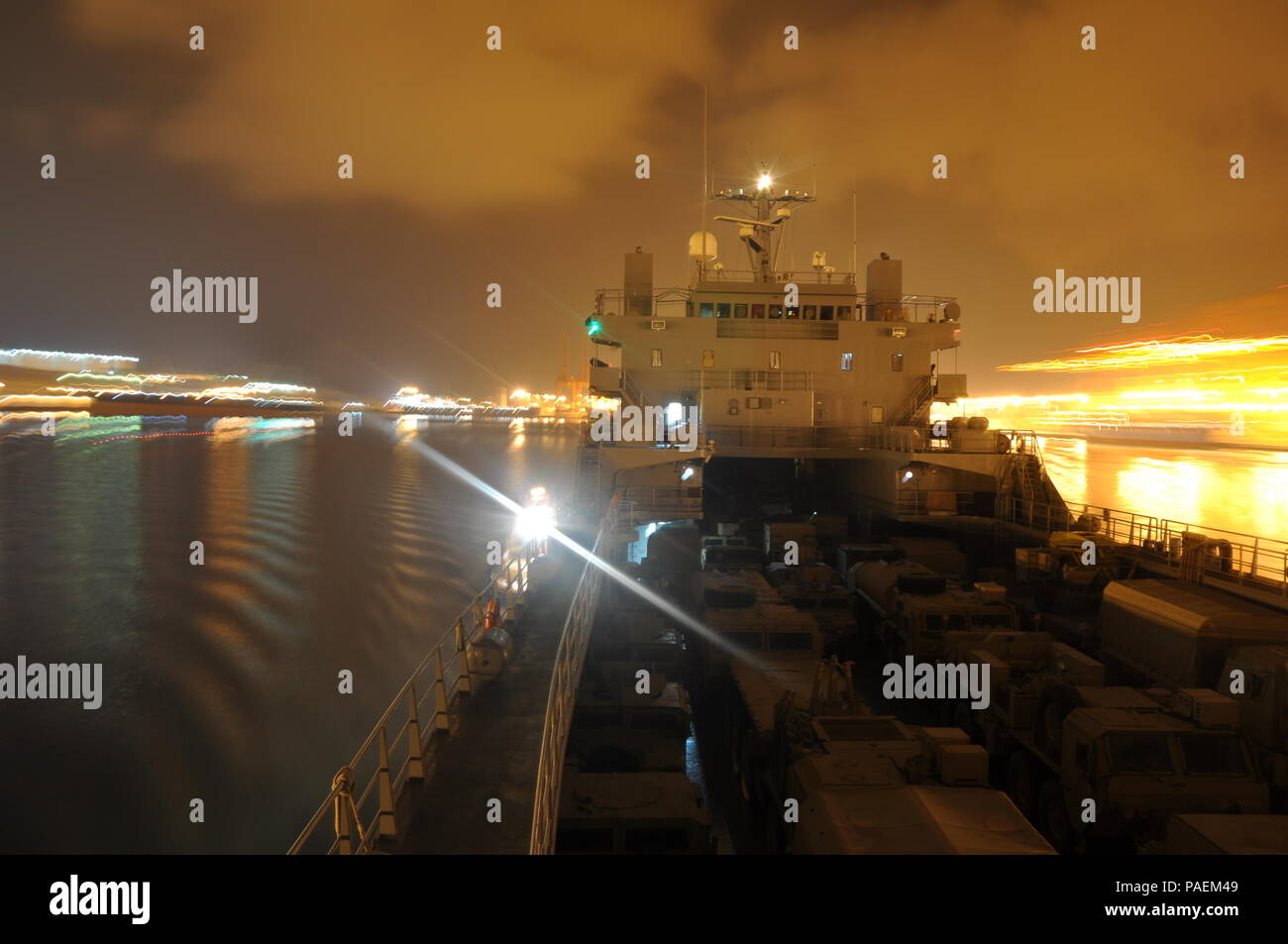 The SP4 James A. Loux (LSV-6) slowly moves its cargo away from port during a mission to Port Salalah, Oman March 6, 2016.    An Army LSV can move a full load of cargo over 6,000 miles over open ocean before it needs to be refueled. By comparison, San Francisco, California to Honolulu, Hawaii, is just over 2,300 miles. Stock Photo
